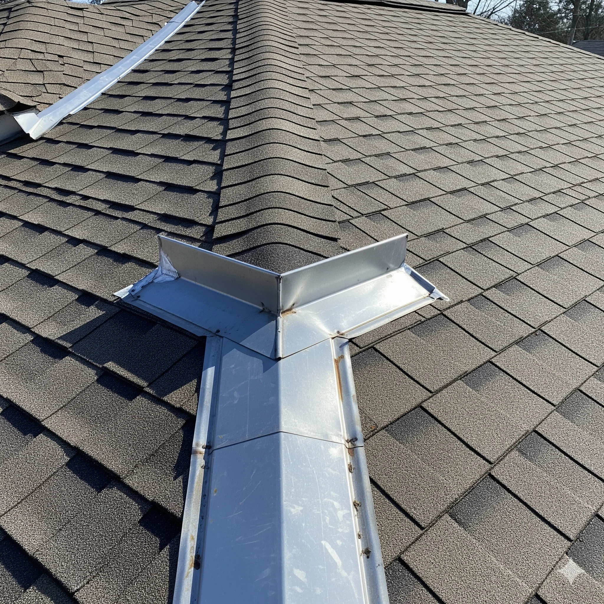 Roof inspection showing shingles drainage and moisture assessment in Northern Virginia